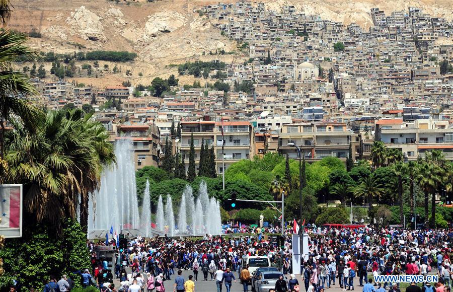 SYRIA-DAMASCUS-PRO-GOVERNMENT-RALLY