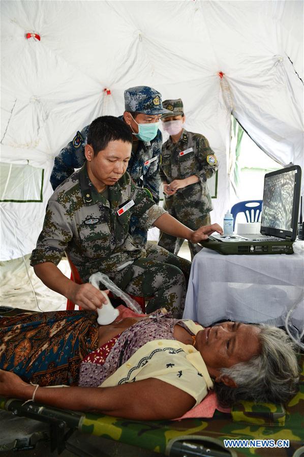 LAOS-SANAMXAY-CHINA-PLA-PEACE TRAIN-MEDICAL TEAM-TREATMENT