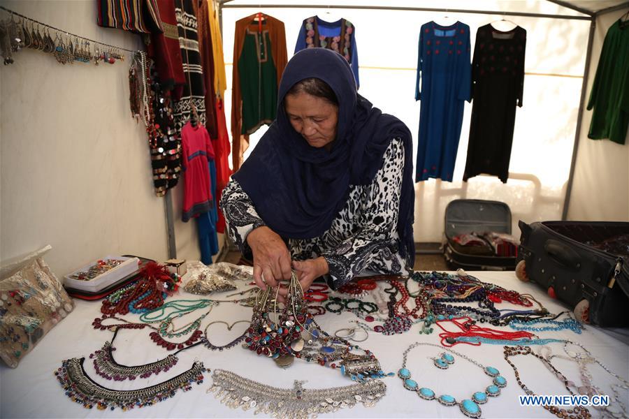 AFGHANISTAN-KABUL-PRODUCT EXHIBITION-WOMAN