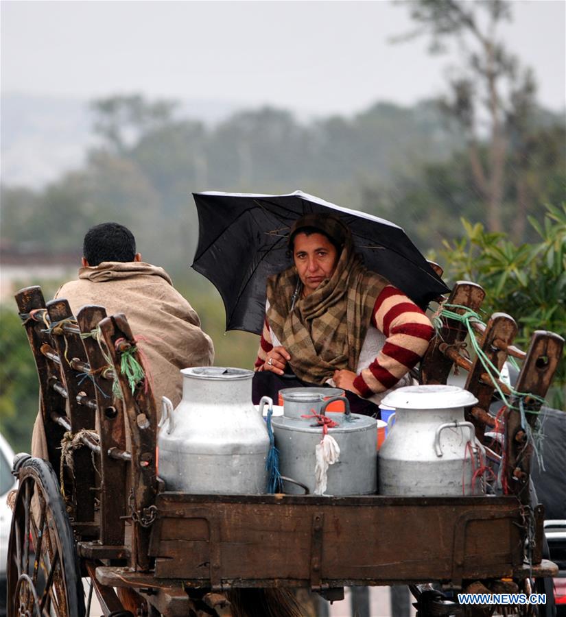 KASHMIR-JAMMU-WEATHER-RAIN