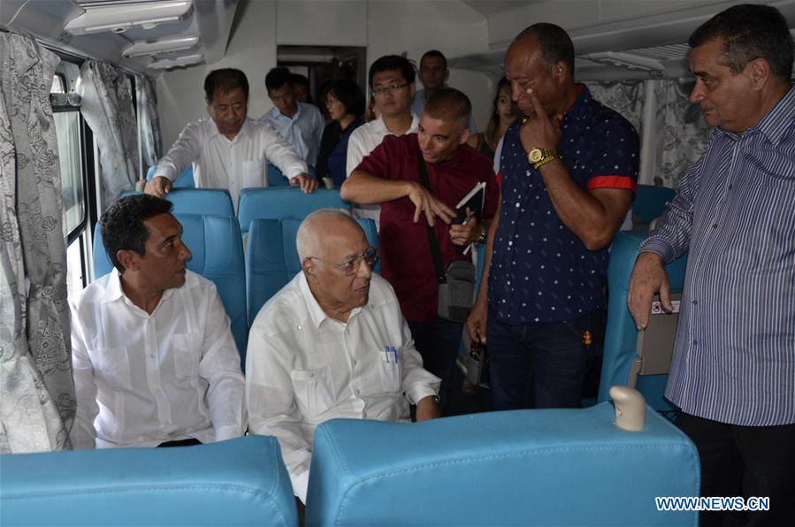 CUBA-HAVANA-CHINESE PASSENGER CARS-HANDOVER