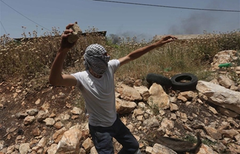 Palestinian protesters clash with Israeli soldiers near West Bank city of Nablus