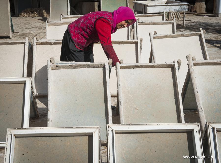 The handmade mulberry-bark paper, originating thousands of years ago in Xinjiang, has been listed as intangible cultural heritage by the UNESCO.