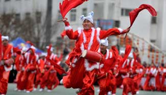 Dancers perform waist drum dance to celebrate Chinese New Year in NW China