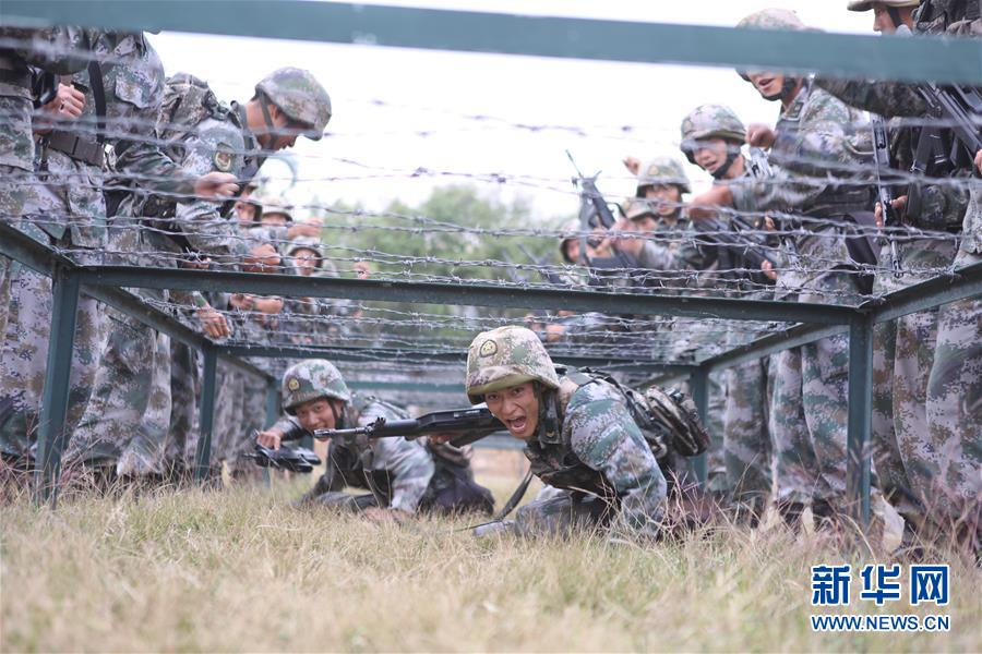 （在习近平强军思想指引下·我们在战位报告·图文互动）（3）千里移防，铁心跟党走——南部战区陆军第75集团军某红军旅政治建军、练兵备战记事