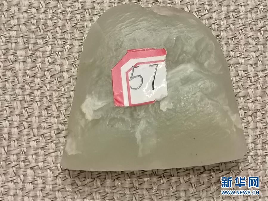 （文化视点·听文物讲故事·图文互动）（1）豪横！古人扛着玉斧在罗布泊打猎